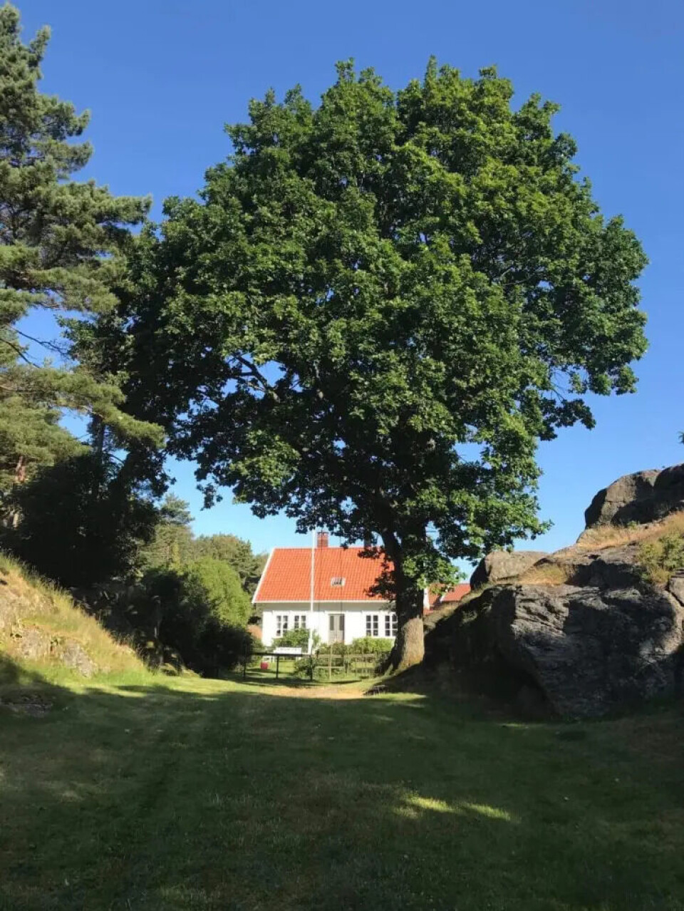Farmen huset sett fra sjøsiden